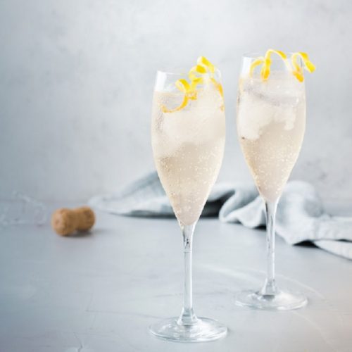 Food and drink, party holiday concept. Alcohol beverage cold cool champagne cocktail drink on a modern table for summer days. Copy space background